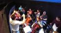Professor Marc Schapman leads the student orchestra during rehearsals. (Photo by Joseph Lacdan)