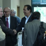 The University of Havana delegates shaking hands before their lecture on their visit to SIUE